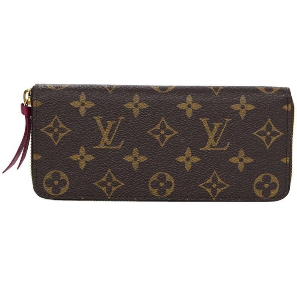 Louis Vuitton Monogram Clemence Zip Around Wallet Features magenta coated canvas